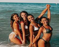 Alisa loves to hang out at beaches with her friends.